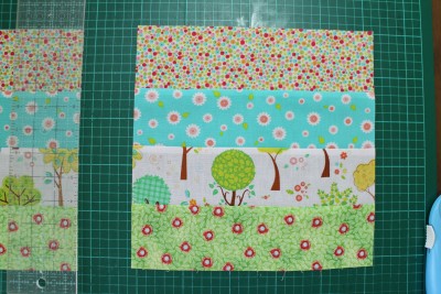 You need to cut the material up as wide as it is high, right along the long strip. I got four big squares off each one.