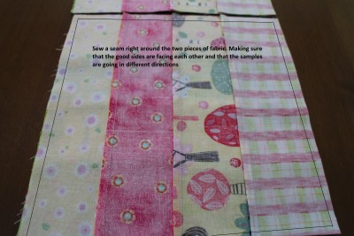 Put the two different ones together with the right sides facing each other and sew a quarter inch seam right around the outside of the square.