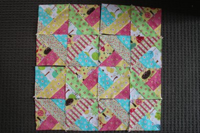 Once all four big squares have been cut up, place them together again in the way that you want to sew them up.