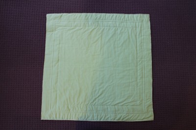 Now I have added the backing and finished the outer rows of top stitch through all the three layers.