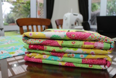 All folded up ready to be given to two very special little babies. Fable got the green edged one, and Zoe got the pink edged one.