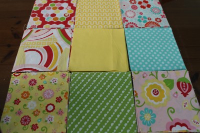 I chose nine different fabrics with the 'busy' fabrics placed in each corner. These are the squares that remain whole and I wanted the pattern to be complete. I wished I had replaced the left middle fabric with one that was more of a plain fabric, but as it matched perfectly, I thought it would be okay :-)