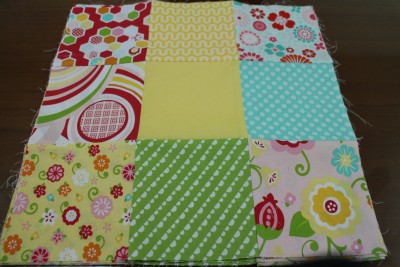 The nine squares have now been sewn together and pressed. Can you see how the seams fit together nicely. That is the aim, so when you top stitch at the end, the lines are straight :-)