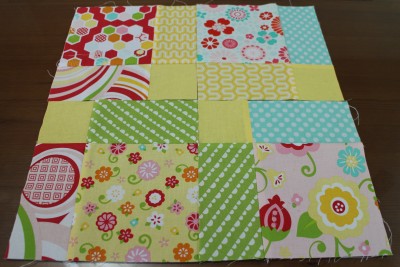The cut 'new' squares can now be placed together again. You can put them in any direction as you like. Try them all out to see what you like best before you start to sew them together again.