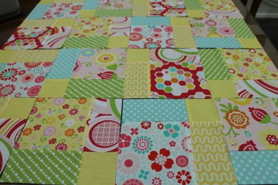 I have placed all the fabric pieces together to get an idea of the finished pattern. I liked this layout so next stage is to sew them together. I sew each row, and then join the rows up. Making sure to press the seams after sewing. The rows have the seams ironed laying opposite directions. This is to help the joins to fit together nicely when you sew the rows together